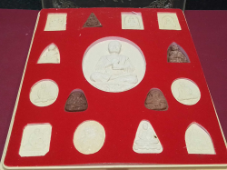 A  boxed set of 15 amulets  