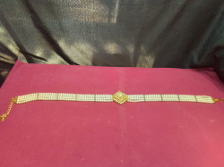 A Multi-Strand Pearl with Diamond’s and Gold-Plated Wedding Belt.