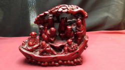 A Red Fiber Village Scene.
W.19 H.17 Cm.