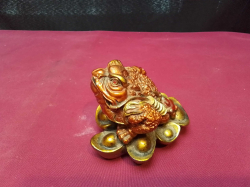 A Chinese lucky money frog.L.9 H.6 Cm.