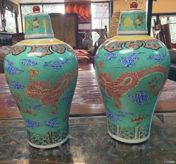 A very nice pair 
 6 character mark Chinese hand painted porcelain  vases and covers with five claw dragon symbol of imperial authority and power. W.23 H.40 Cm. 