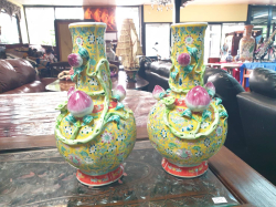 A beautiful pair of Chinese yellow imperial colour hand decorated enameled  porcelain vases. with Chinese seal mark to the base  in wonderful condition.W.20 H.38 Cm.