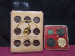 2 Boxes of nine Thai Amulets