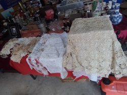 A Large Job lot of tablecloths, plates Mat and curtains.