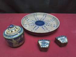 An old Chinese blue and  white dish decorated with Chinese hieroglyphics it has a six character mark to base also the rim has a  brass edging to prevent fritting There is also a blue and white incense burner decorated with Chinese figures & 2 small boxes