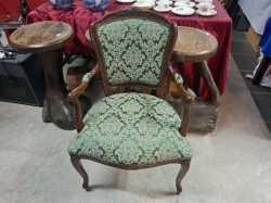An English French style occasional chair with padded arm rest
