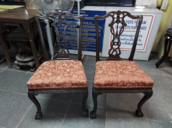 A beautiful pair of hand carve Victorian c,1880 mahogany chairs in the Chippendale style Standing on carbrio legs with ball claw feet