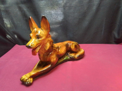 A Beautiful Porcelain Sculpture of a German Shepperd  Dog from 1940s to 1950s Still in lovely condition. L.38 H.27 Cm. 