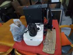 A Complete Computer Set including 2 keyboards, Screen, printer, fans, Camera, cables etc. (sell as seen)