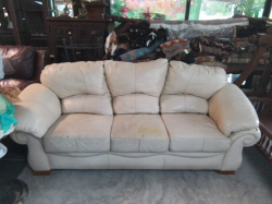 A Cream Leather  3 Seater Sofa. D.82 L.225 H.88 Cm.