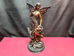 A Beautiful Vintage Hot Cast Bronze Winged Lady 16 inches Tall  Holding Flowers Art Noveau Design with A lovely Patina