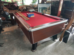 A Pool Table Complete with Pool Balls and 5 Cues. W.127 L.219 H.83 Cm. 