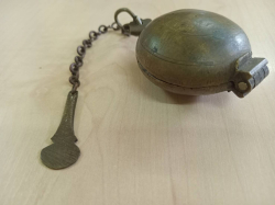 A Small Beetle Nut Past Mixer Solid Bronze with Chain Mixer. W.4 H.6 Cm.