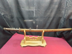 Beautiful Japanese marked samurai sword L.92 Cm. on luxury sandal wood stand W.16 L.36 H.23 Cm.