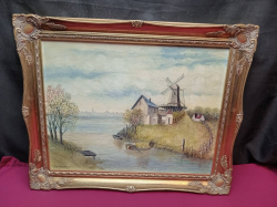 An Oil on board Windmill by E Waterson. 45x55 Cm