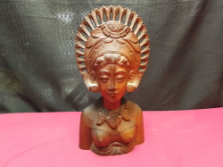 A very large hand carved Aztec wooden figure if a woman  in excellent condition. W.14 H.27 Cm.