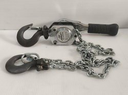 A compact lever hoist , 250 kg. capacity