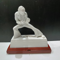 A vtg. 1980 Elvis Presley McCormick music box whiskey decanter on wooden base. W.13 L.31 H.32 Cm.  