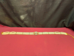 A Multi-Strand Pearl with Diamond’ sand Gold-Plated Wedding Belt. 