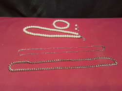 Pearl Necklace, Bracelet with earrings, and 2 Silver Chain’s. 