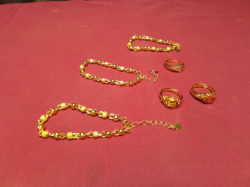 3 Bracelets, 3 Rings all Gold Plated. 