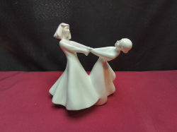 A Lovely Pair of Royal Doulton Figurine Lady Dancers Figure of the year ( Best Friend) Mint Condition. W.17 H.17 Cm.