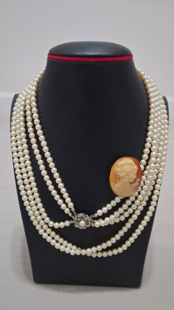 Beautiful vintage necklaces and  lovely cameo Brooches. 