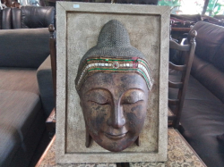 A Large Carved Buddha Head in a Frame. W .54 H.76 Cm.