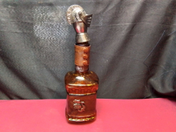 A Vintage Leather Amber Glass Decanter Bottle Pourer Medieval. W.10 H.35 Cm.