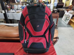 A red & black good quality backpack retractable wheels.  