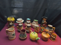 A Large Job Lot of Character Toby Jugs and 4 others.