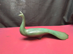 A cast iron bronze peacock Sculpture. L.37 H.18 Cm.