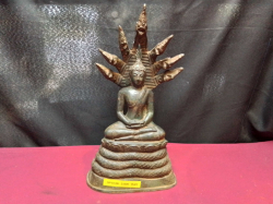 A Bronze Buddha Statue in the posture of the Naga. W.12 L.18 H.34 Cm.