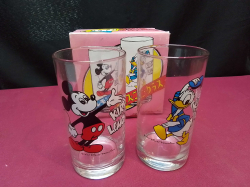 A Boxed of 2 Glasses of mickey mouse and Donald duck glass tumblers