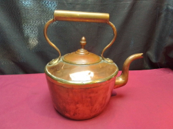 A Large Copper Kettle. L.28 H.28 Cm. 
