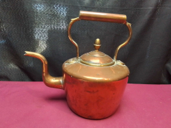 A Large Copper Kettle. L.29 H.27 Cm. 