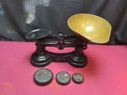 A Nice Victorian Salter Brass Shop Scale with weights.