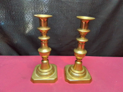 A Pair of Brass Candle Sticks. H.21 Cm.