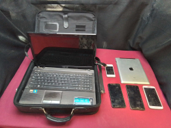 ASUS notebook with case, 1 iPad, 4 Mobliephones ( sell as seen)