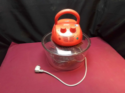 An electric air fryer pot. (Family brand)