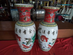 A Pair of Tall Chinese Vases. 24