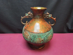 A vintage bronze hand painted vase with dragon handle. Stamped to base. W.18 H.22 Cm.