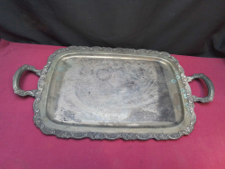 A Vintage WM Rogers &Son Silver Plated serving Tray featuring an ornate, Etched design and two handles. W.34 L.62 H.5 Cm.