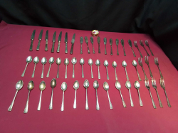 51 Pieces Silver Nickle Plated Cuttery and 1 small Trinket.