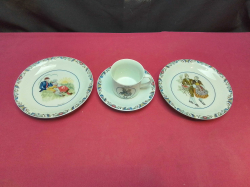 2 Plates W.17 Cm and a cup and saucer all in Swedish traditional costume