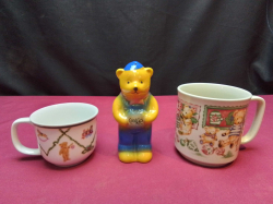 2 Collectable bear mugs and a bear figures H.13 Cm.