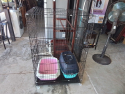 A Cat /Dog cage on wheels pull out tray D.51 W.75 H.117 Cm. with toilet box /carrier box.
