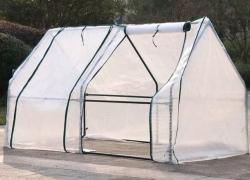 A Small Garden Greenhouse. 2 meter long+ 150 Cm. High.