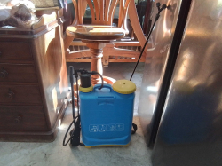 A Blue and Yellow 16 liter manual knapsack Sprayer.