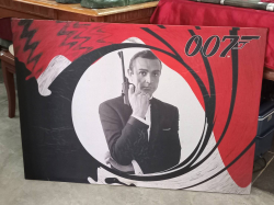 A poster features Sean Connery as James Bond inside the iconic 